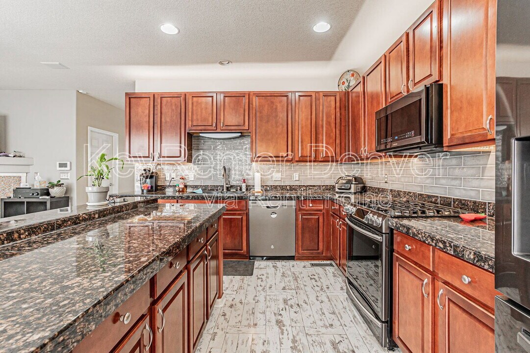 15612 E 96th Way in Commerce City, CO - Building Photo