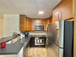 851 Lyons Rd, Unit 22106 in Coconut Creek, FL - Foto de edificio - Building Photo