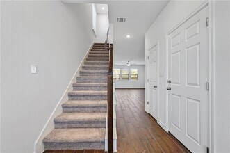 806 Pepperbark Loop in Mustang Ridge, TX - Building Photo - Building Photo