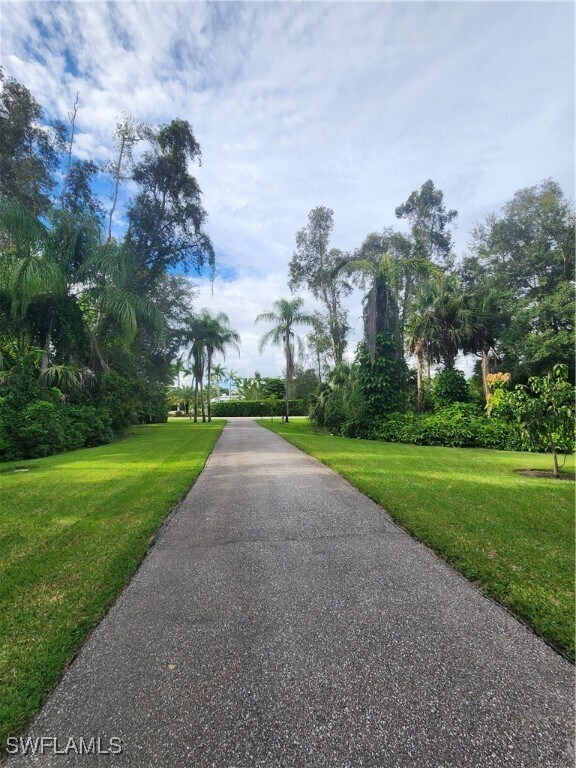 5930 Spanish Oaks Ln in Naples, FL - Building Photo - Building Photo