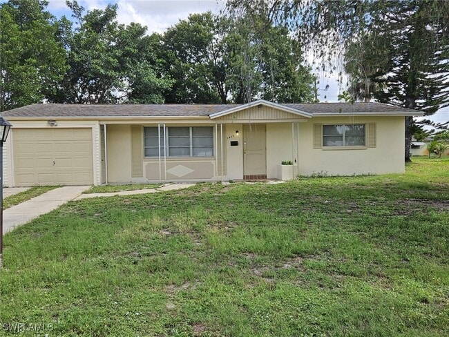 1407 Juddale St E in Lehigh Acres, FL - Building Photo - Building Photo