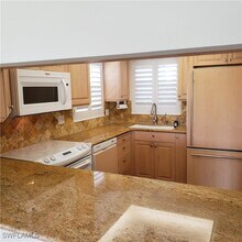 57 High Point Cir W in Naples, FL - Building Photo - Building Photo