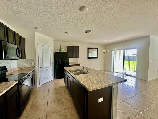 273 St Georges Cir in Eagle Lake, FL - Building Photo - Building Photo