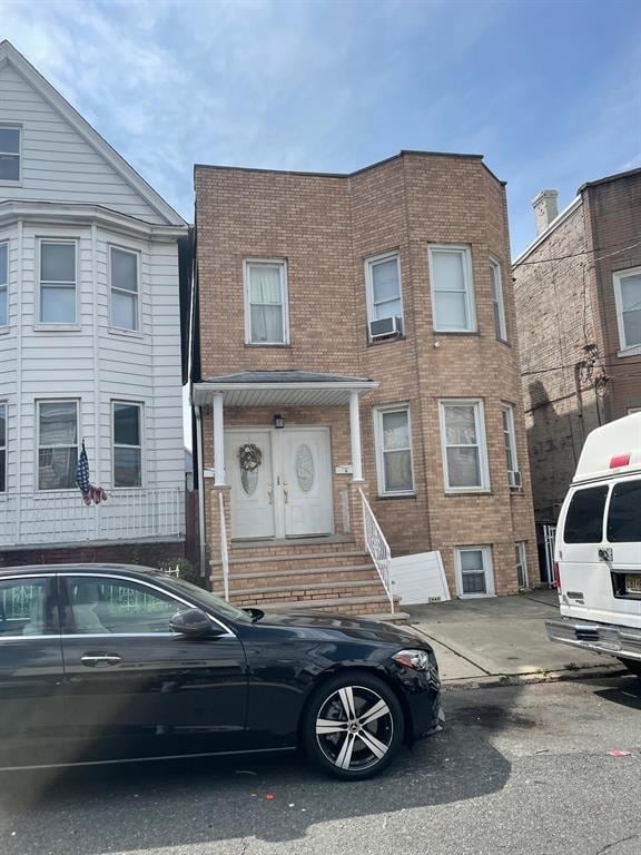 property at 122 W 20th St