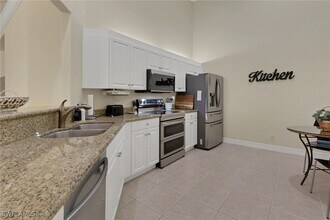 15079 Sterling Oaks Dr in Naples, FL - Building Photo - Building Photo