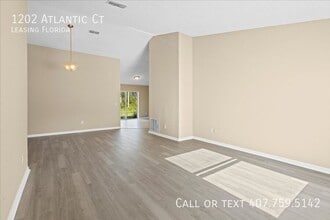 1202 Atlantic Ct in Poinciana, FL - Foto de edificio - Building Photo