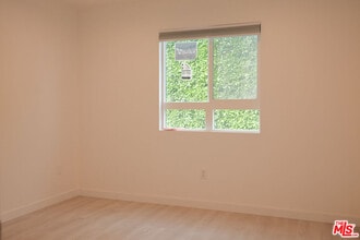 419 S Clark Dr in Beverly Hills, CA - Building Photo - Building Photo