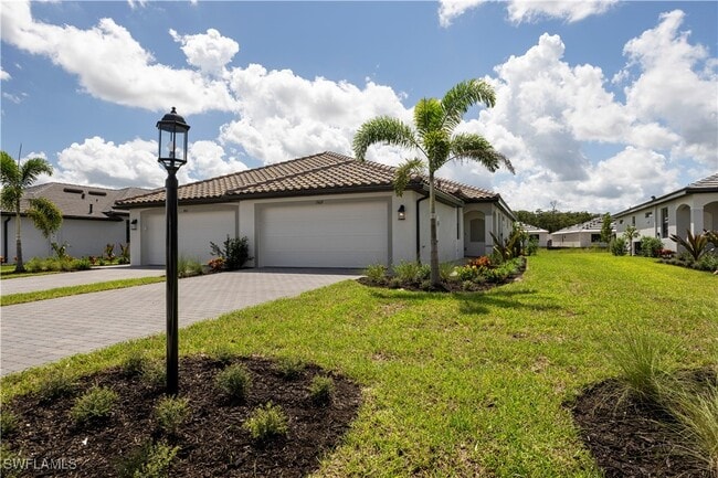 19609 Hinkley Dr in Estero, FL - Building Photo - Building Photo