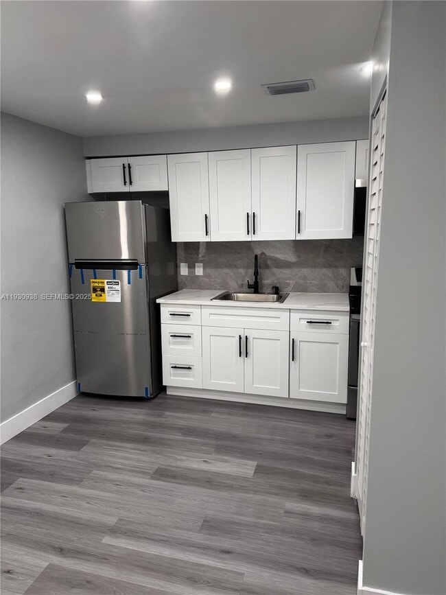 property at 3033 NW 32nd St