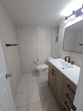 11610 N Bayshore Dr, Unit 1H in North Miami, FL - Building Photo - Building Photo