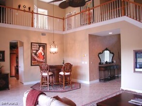 2312 Island Cove Cir in Naples, FL - Foto de edificio - Building Photo