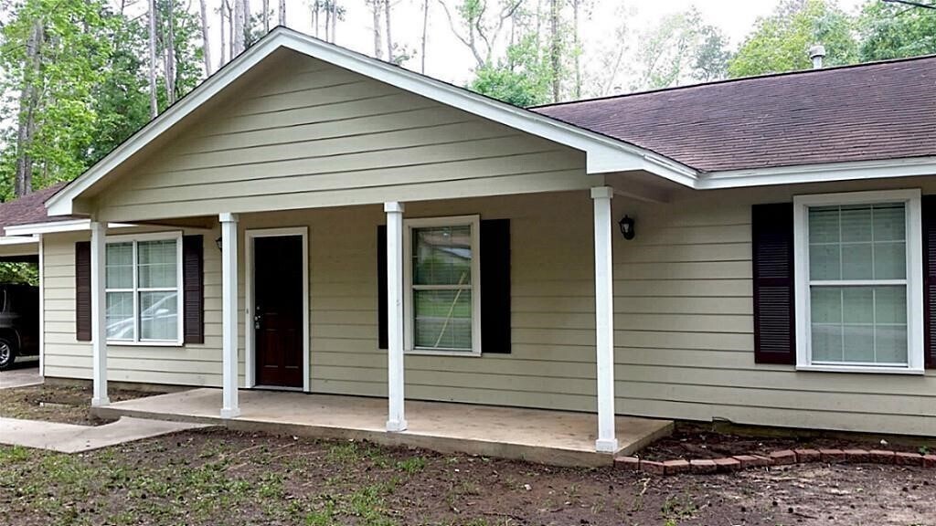 15353 Kickapoo Trail in Willis, TX - Building Photo