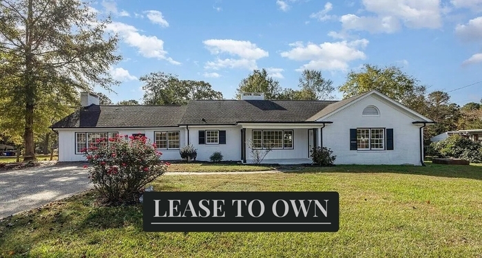 203 W Stewart St in Coats, NC - Building Photo