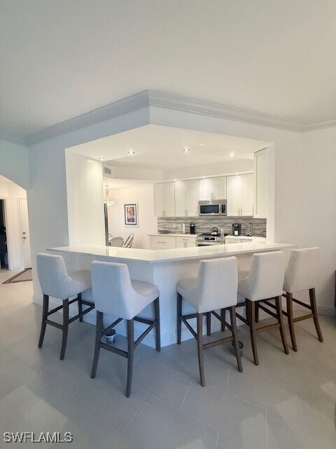 7056 Pelican Bay Blvd in Naples, FL - Building Photo - Building Photo