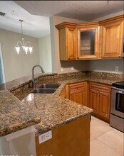 7667 N Wickham Rd, Unit 724 in Melbourne, FL - Foto de edificio - Building Photo