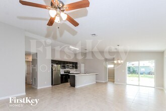 1430 SW Santiago Ave in Port St. Lucie, FL - Building Photo - Building Photo