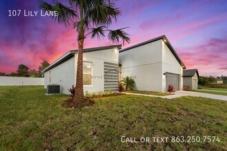 107 Lily Ln in Poinciana, FL - Building Photo - Building Photo