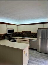 4628 Suburban Pines Dr in Greenacres, FL - Building Photo - Building Photo
