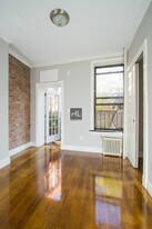 E 1ST ST. in New York, NY - Building Photo