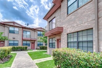 9400 Bellaire Blvd in Houston, TX - Building Photo - Building Photo