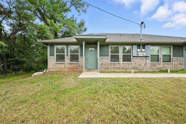 324-326 W Munson St in Denison, TX - Building Photo