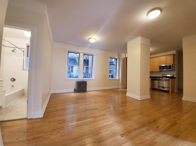 property at 117 W 13th St
