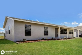 10745 Cocoatree Ct in Lehigh Acres, FL - Building Photo - Building Photo