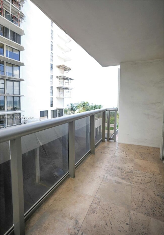 property at 6039 Collins Ave