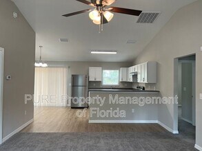 309 Malauka Run in Ocklawaha, FL - Building Photo - Building Photo