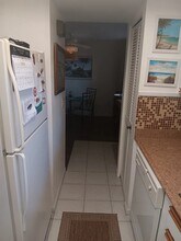 1701 Pinehurst Rd, Unit 9-E in Dunedin, FL - Foto de edificio - Building Photo