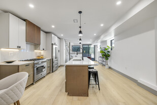 566 E 3rd St, Unit #1 Apartamentos