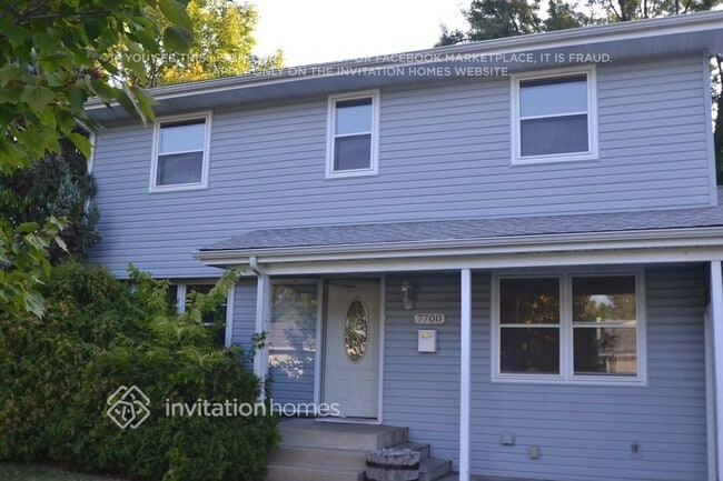 property at 7700 Orchard Ave N