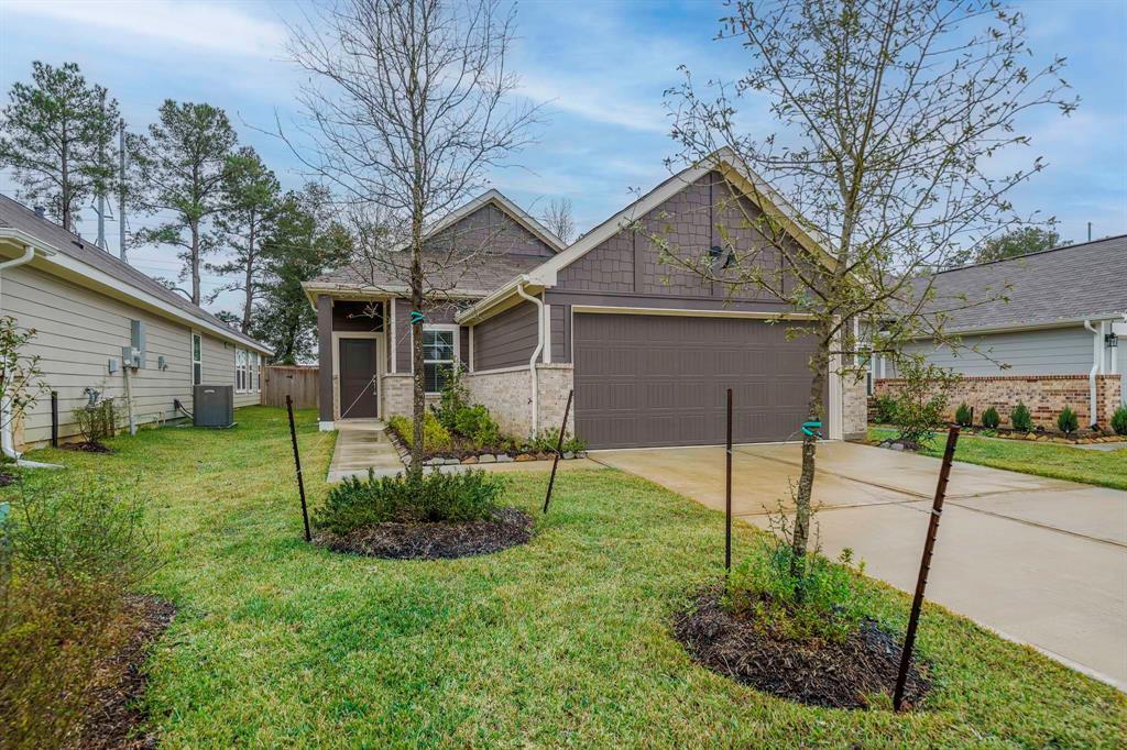 1118 Kinsey Wilderness Ln in Conroe, TX - Building Photo