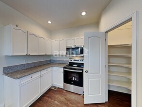 10439 Vaughn Way in Commerce City, CO - Building Photo - Building Photo