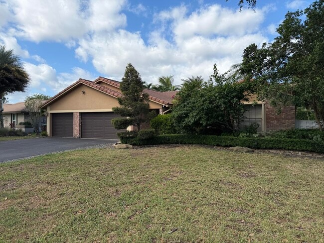 5434 NW 87th Terrace in Coral Springs, FL - Foto de edificio - Building Photo