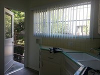 Kitchen/Back Door - Ladera Townhouse Apartments in Los Angeles, California