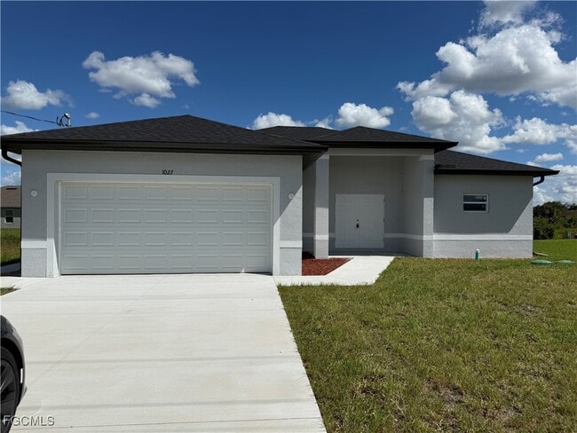 1027 Eisenhower Blvd in Lehigh Acres, FL - Building Photo - Building Photo