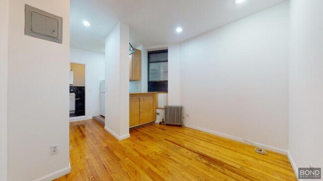 property at 214 E 10th St