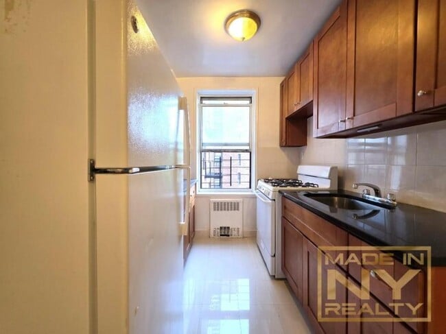 property at 65-10 108th St