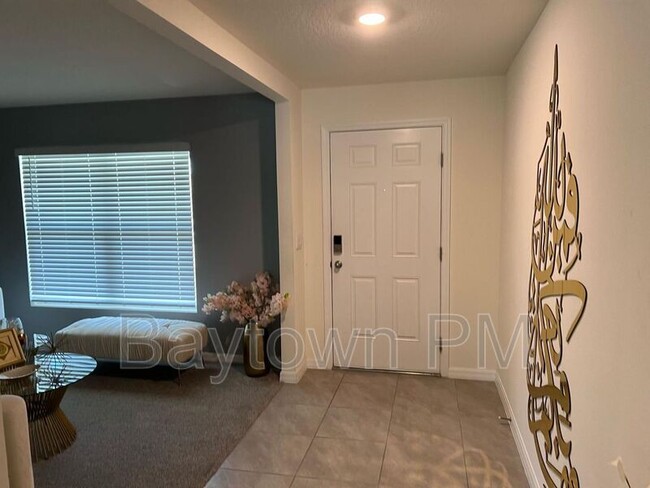7737 Rosewood Gdn Lp in Tampa, FL - Foto de edificio - Building Photo