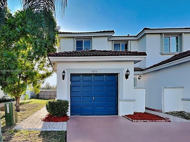 property at 4856 NW 116th Ct