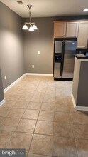 9713 Handerson Pl-Unit -302 in Manassas Park, VA - Building Photo - Building Photo
