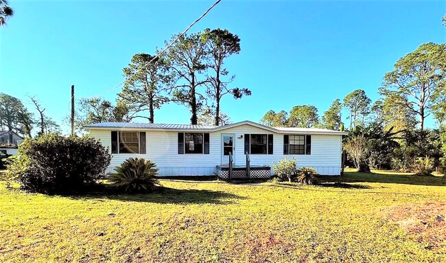 property at 118 W Rogers St