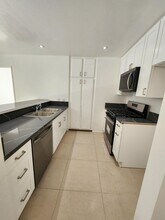 7640 Oso Ave, Unit 220 in Winnetka, CA - Building Photo - Building Photo