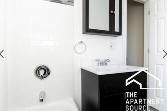 648.5 W Roscoe St, Unit 1 in Chicago, IL - Foto de edificio - Building Photo