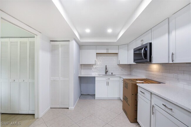 property at 5954 Pelican Bay Blvd