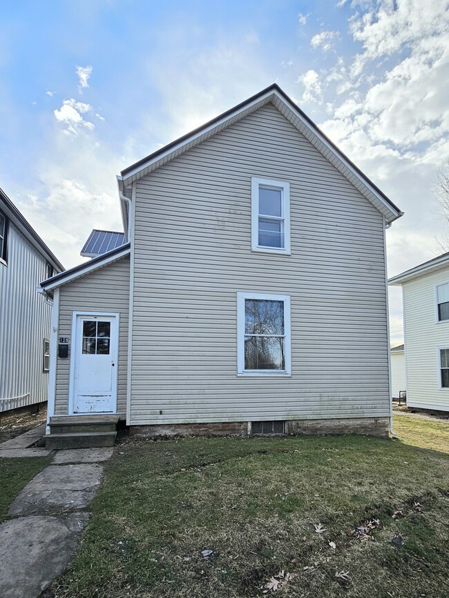 property at 129 W Perry St