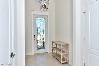 13509 San Georgio Dr in Estero, FL - Building Photo - Building Photo