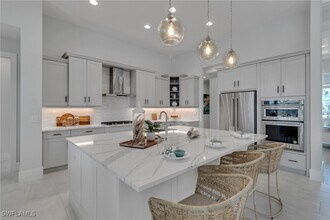 6051 Plana Cays Dr in Naples, FL - Building Photo - Building Photo