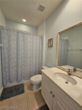 1405 Sweetwater Cove in Naples, FL - Building Photo - Building Photo